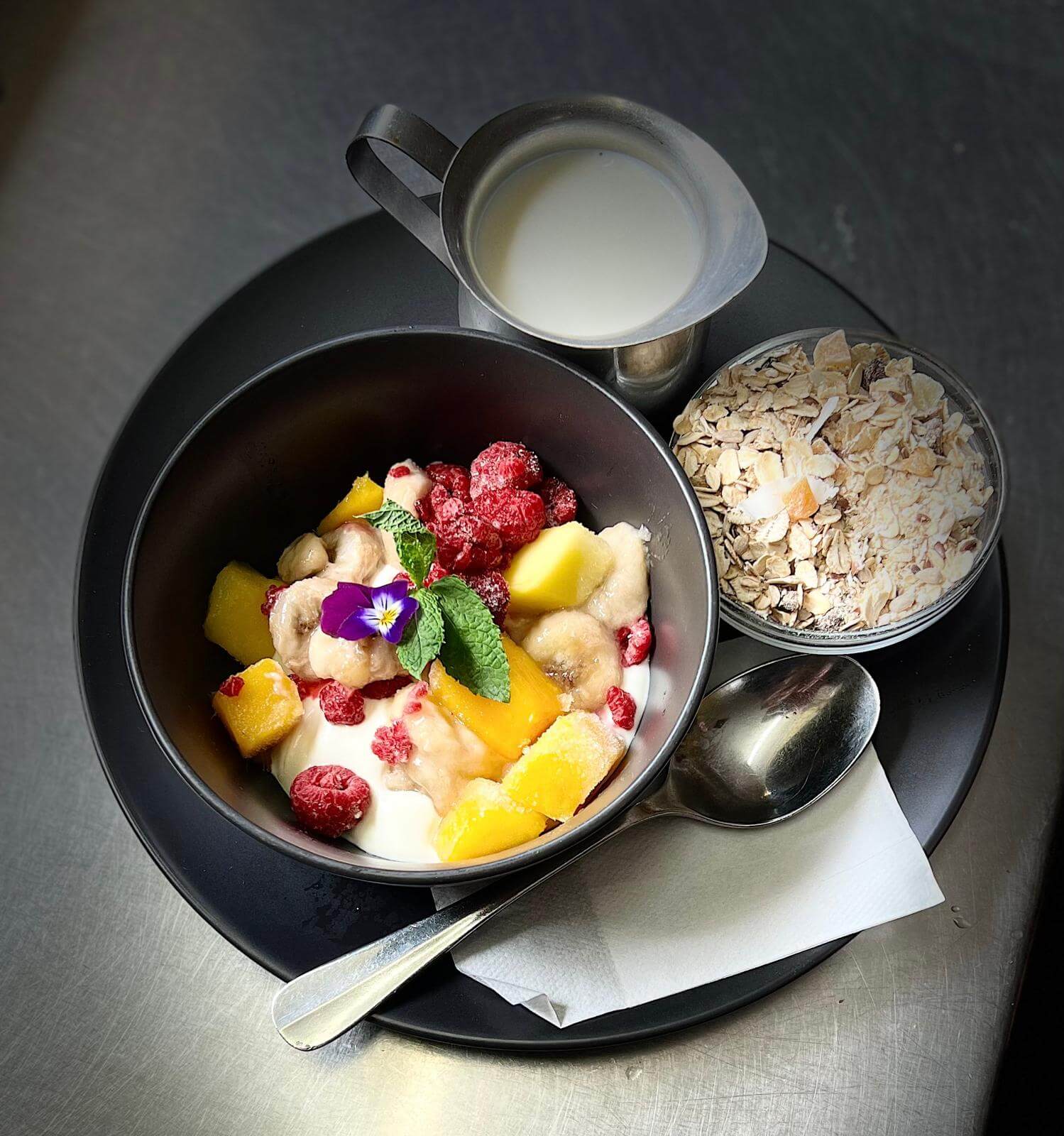 Purple Possum Muesli with Greek Yogurt and Seasonal Fruit